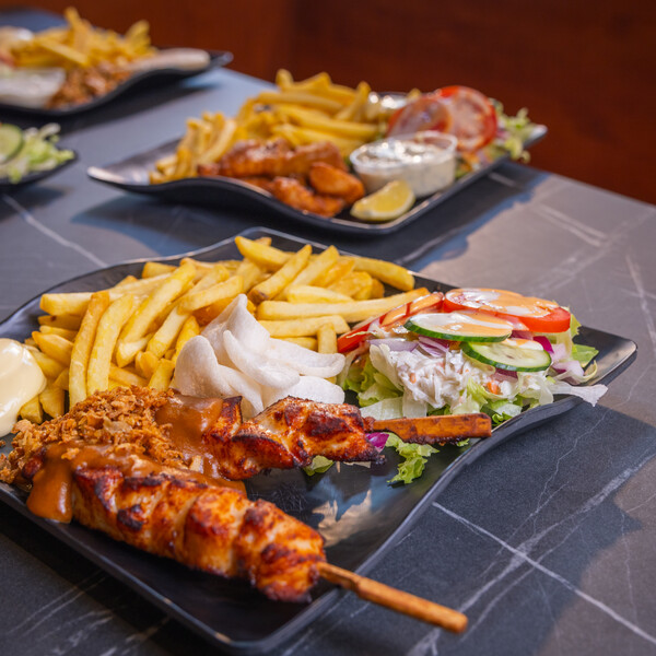 Welkom bij <br>Cafetaria de Klein <br>in Wanssum